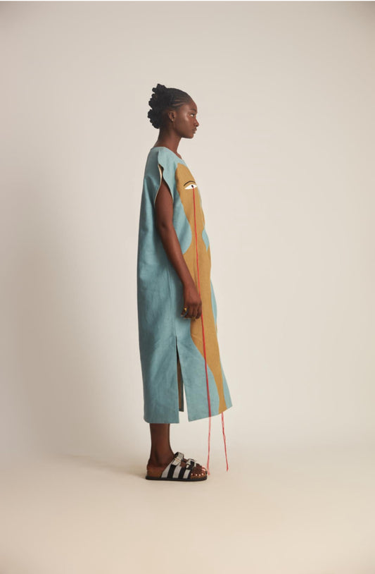 WUMAN FIGURES TEAR MOTIF TUNIC